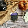 Bootiful Cookie Cutter & Fondant Stamp – Funny Halloween Bake (8cm) Bootiful cookie cutter and fondant stamp displayed on a pastel Halloween-themed plate, 3D-printed from biodegradable food-safe PLA