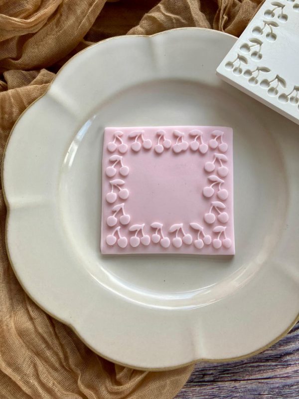 Cherry Frame Fondant Stamp Embosser Cherry frame border fondant stamp cookie on plate