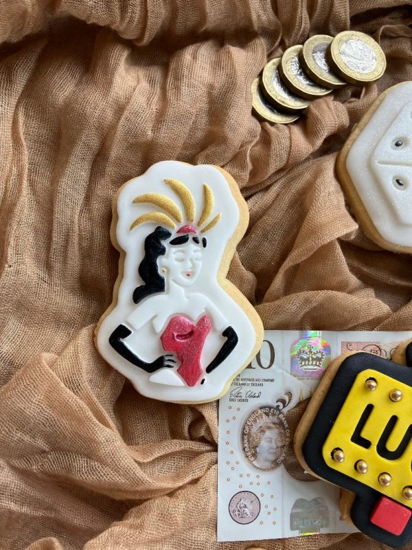 Vegas showgirl cookie cutter and fondant stamp set featuring showgirl dancer design displayed on a purple plate, 3D-printed from biodegradable food-safe PLA