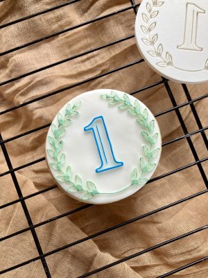 Number 1 fondant stamp embosser on cookie 3D-printed from biodegradable PLA
