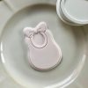 Baby Bib with Bow Cookie Cutter β New Baby Embosser (8cm) 8cm baby bib cookie cutter and fondant embosser with bow detail