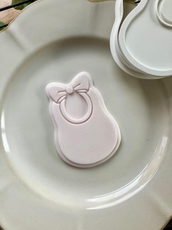 Baby Bib with Bow Cookie Cutter β New Baby Embosser (8cm) 8cm baby bib cookie cutter and fondant embosser with bow detail