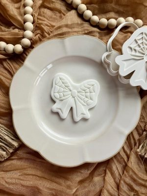 8cm gothic bow cookie cutter and fondant embosser with spider web detail