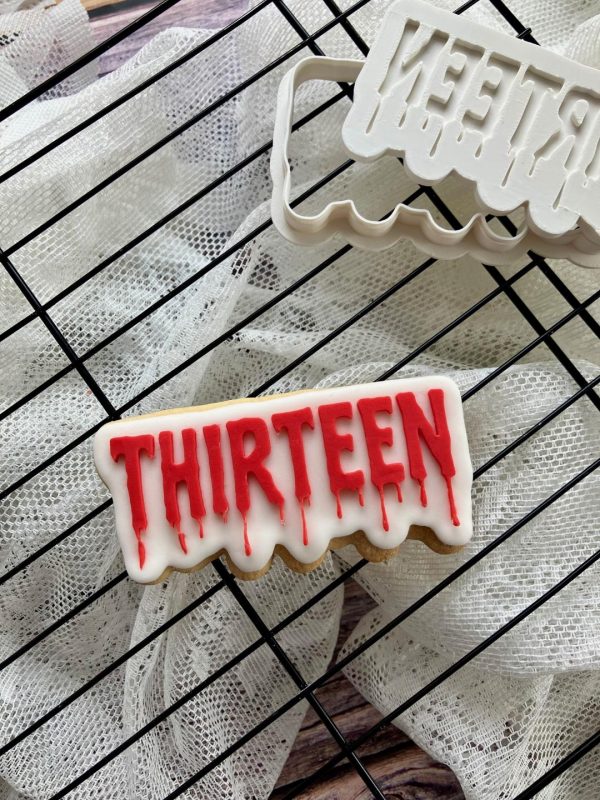 Thirteen Cookie Cutter – Blood Drip Halloween Font (8cm) 8cm cookie cutter and fondant embosser spelling ‘thirteen’ in a blood-dripping horror font
