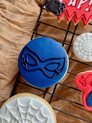 7cm fondant embosser of an eye mask with spider web detail