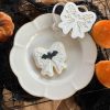 Halloween Bow Cookie Cutter β Bat & Spiderweb Embosser (8cm) 8cm bow-shaped cookie cutter and fondant embosser with bat and spiderweb design